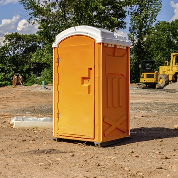 how often are the portable restrooms cleaned and serviced during a rental period in Almena Michigan